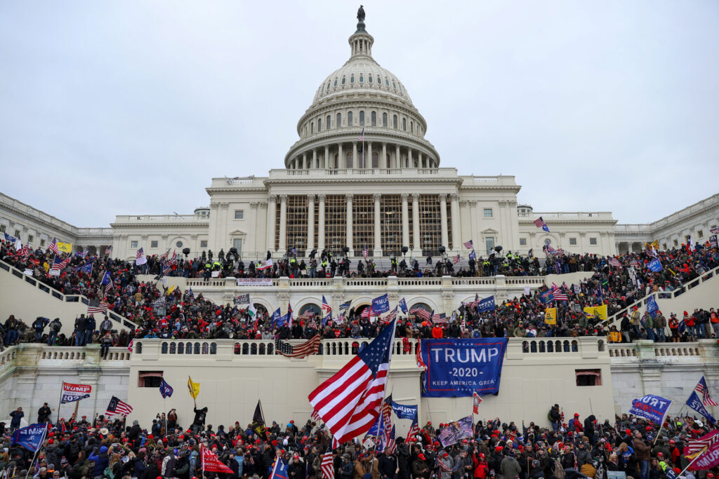 US President Donald Trumps supporters gather outside the Capitol building in Washington D.C., United States on January 06, 2021. Pro-Trump rioters stormed the US Capitol as lawmakers were set to sign off Wednesday on President-elect Joe Biden's electoral victory in what was supposed to be a routine process headed to Inauguration Day.