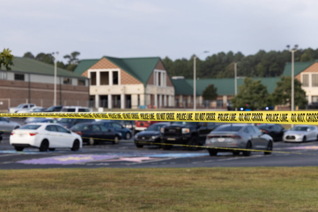 Shooting At Apalachee High School In Winder, Georgia Leaves 4 Dead WINDER, GEORGIA - SEPTEMBER 5: Police tape surrounds the perimeter of Apalachee High School on September 5, 2024 in Winder, Georgia. Two students and two teachers were shot and killed at the school on September 4, and a 14-year-old suspect, who is a student at the school, is in custody. (Photo by Jessica McGowan/Getty Images) | GLAAD