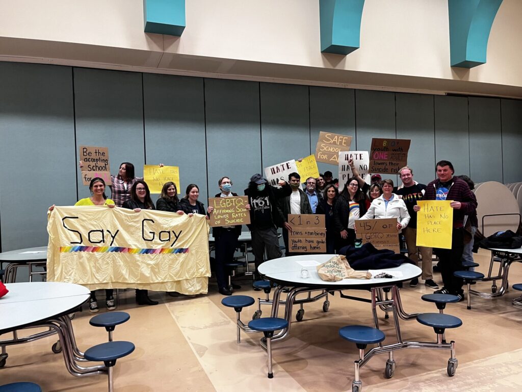 IMG_6702 | GLAAD New Jersey advocates hold up signs of support and with facts strewn across them at a school board meeting where transgender student guidance has been contested